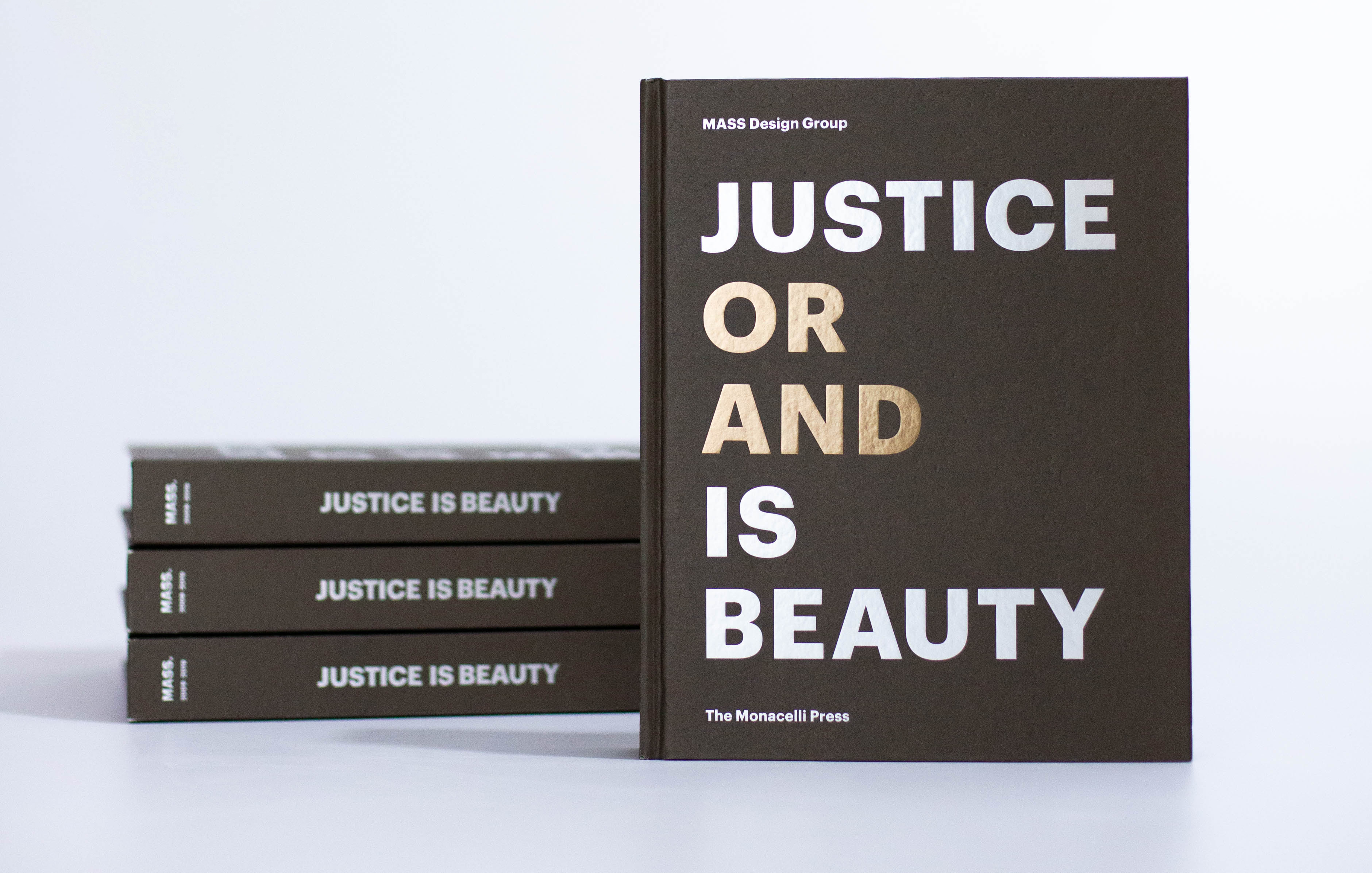 Justice is Beauty books stacked