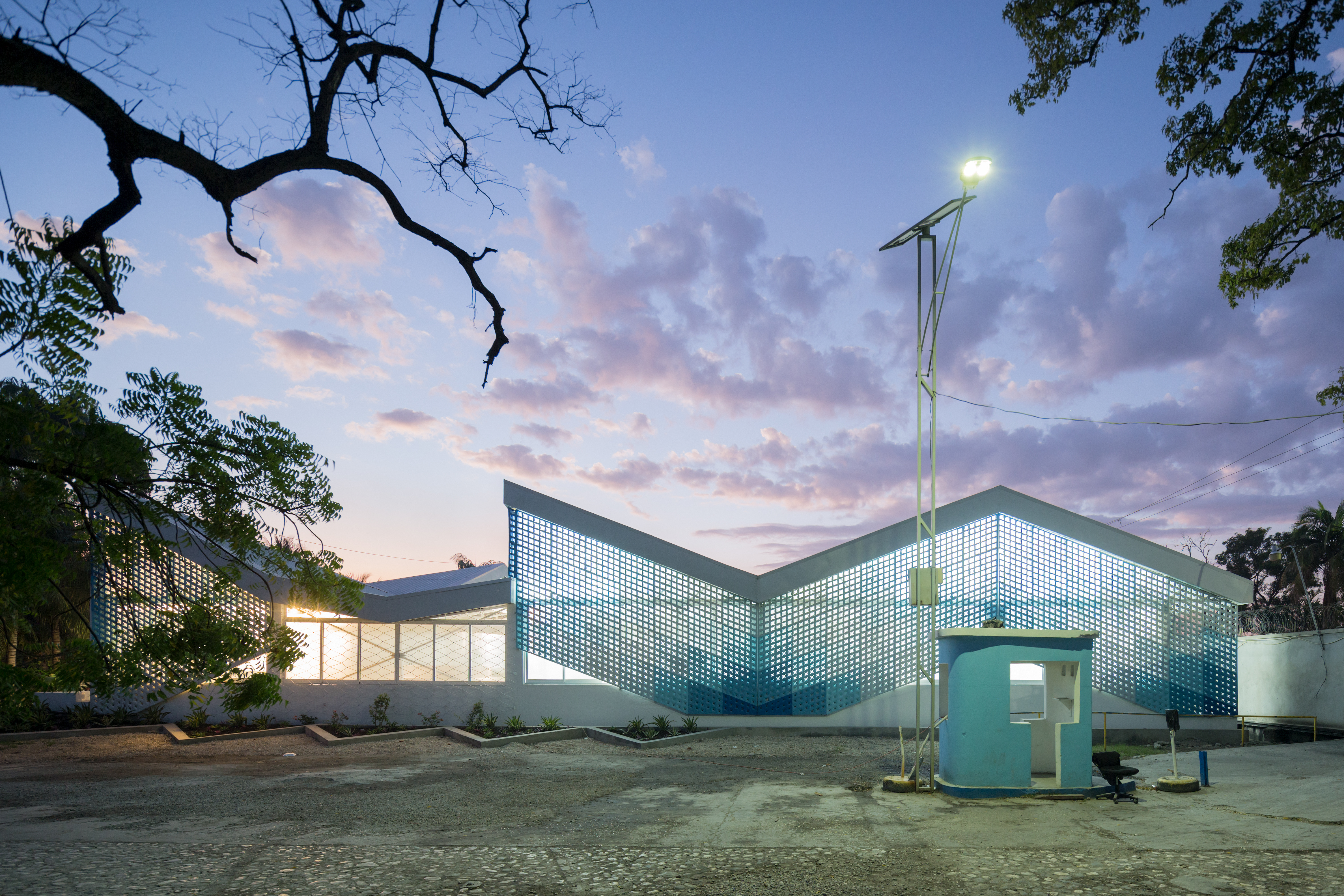 Photo of Gheskio Cholera Treatment Center, Photo by Iwan Baan, Exterior Nighttime View of the Cholera Treatment Center with Gatehouse