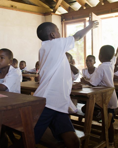 Photo of Ilima Primary School Documentary, Ilima Primary School classroom with teacher and students