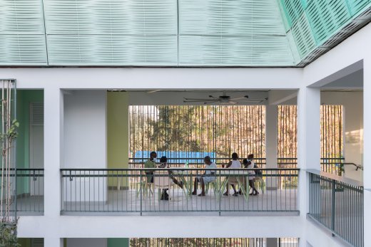 Photo of GHESKIO Tuberculosis Hospital, Photo by Iwan Baan, Patients socialize in an outdoor area